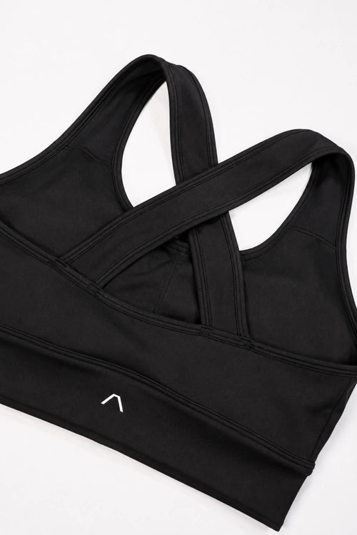 Back of sports bra with ARIS logo visible